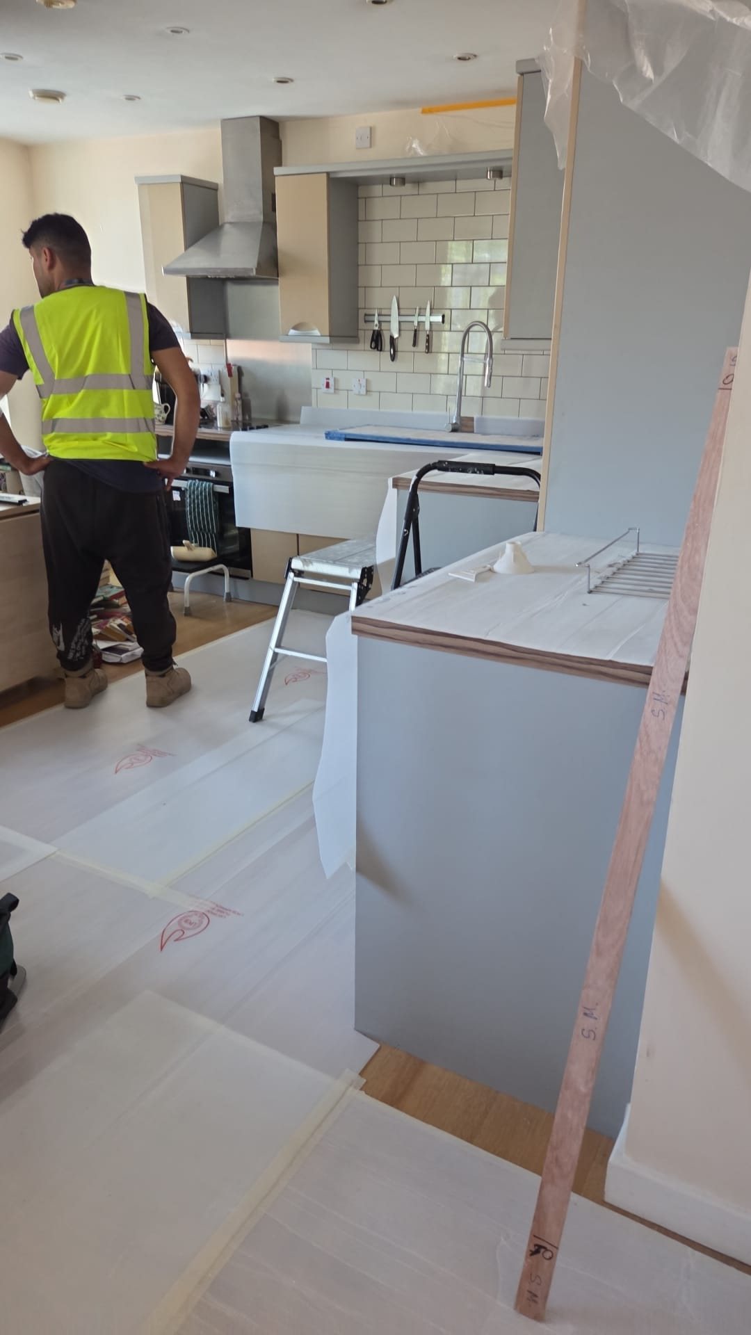 Kitchen being fitted with floor protection down