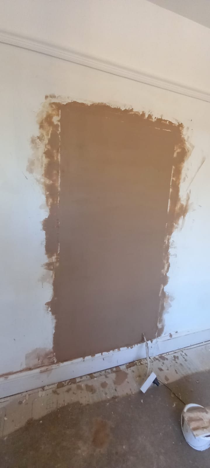 Wall patched and bonded ready for skimming
